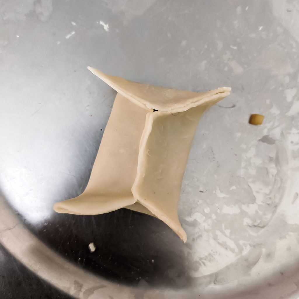 pleating the dumplings