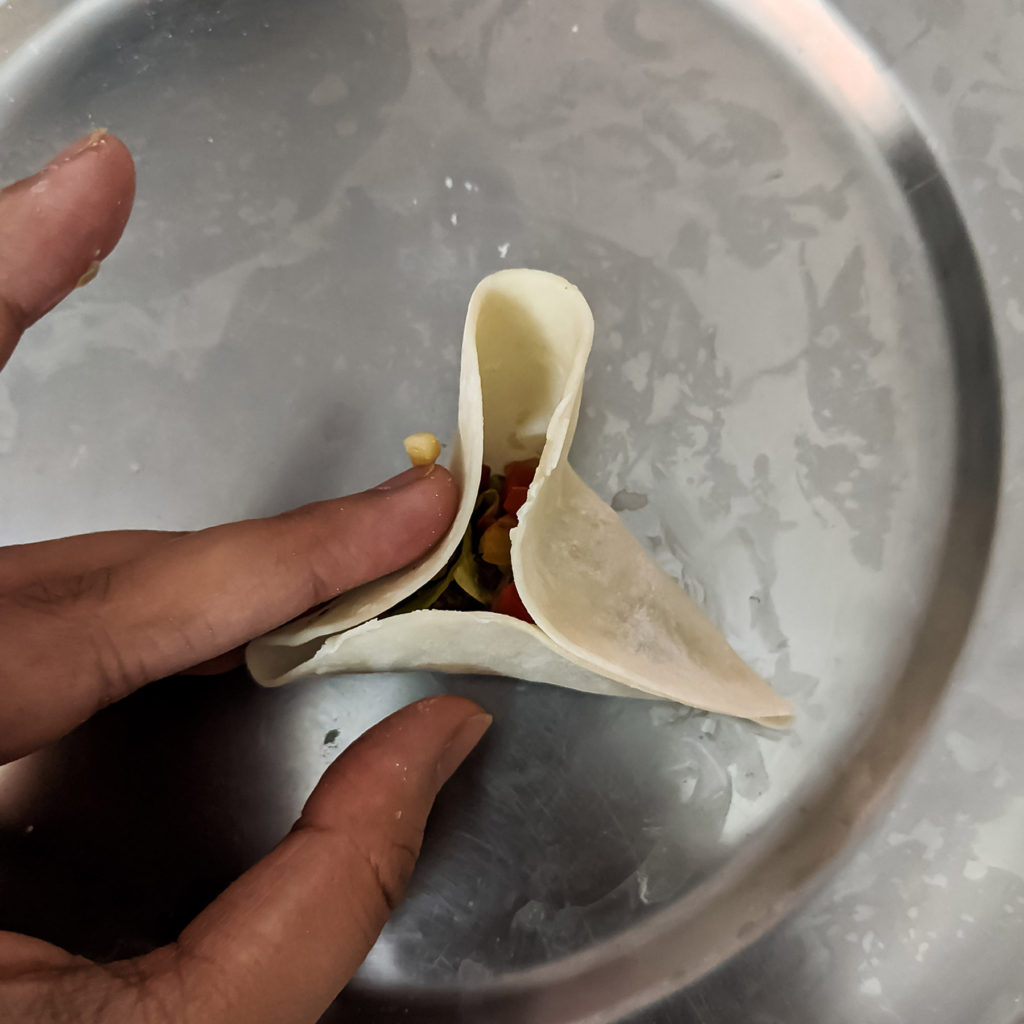 pleating the dumplings